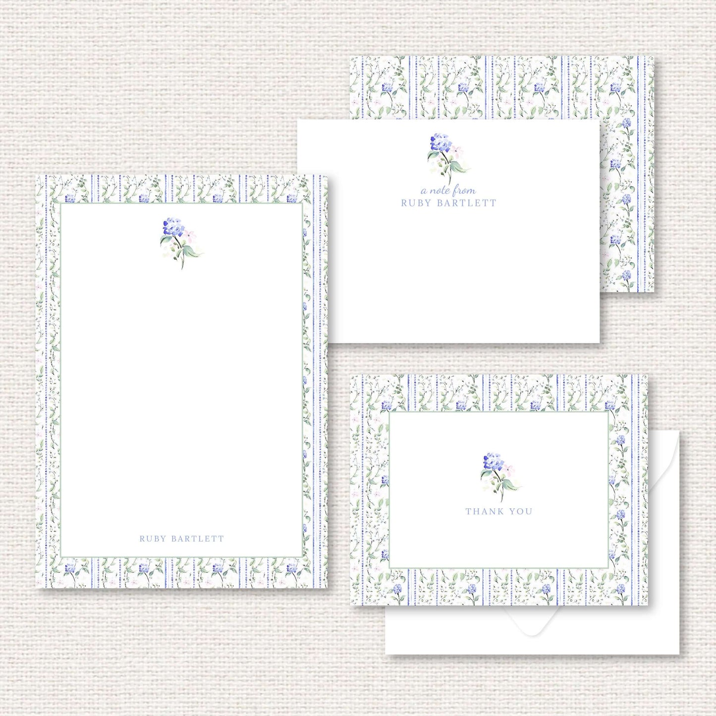 The Eloise Suite gift set includes a grand-millennial pattern applied to a personalized notepad, personalized flat not, and thank you cards