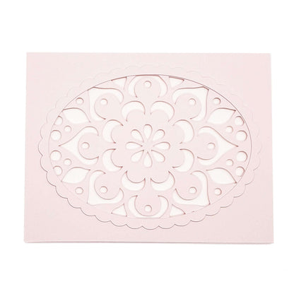 Die cut motif on pink card stock