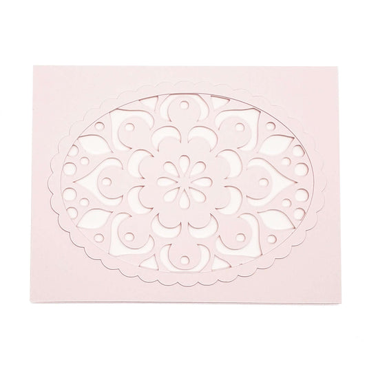 Die cut motif on pink card stock