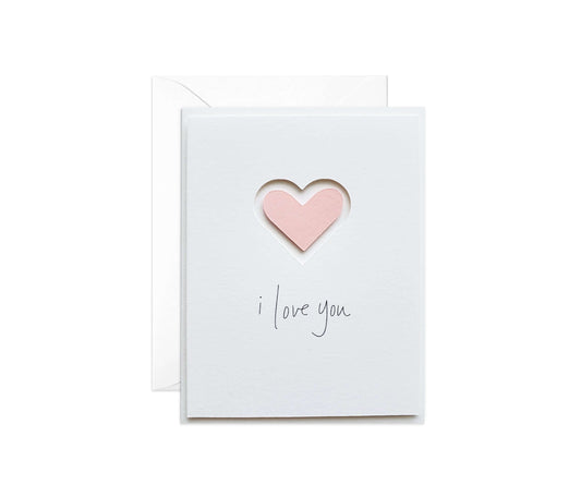 Valentine's Day card with a die cut heart and "i love you"