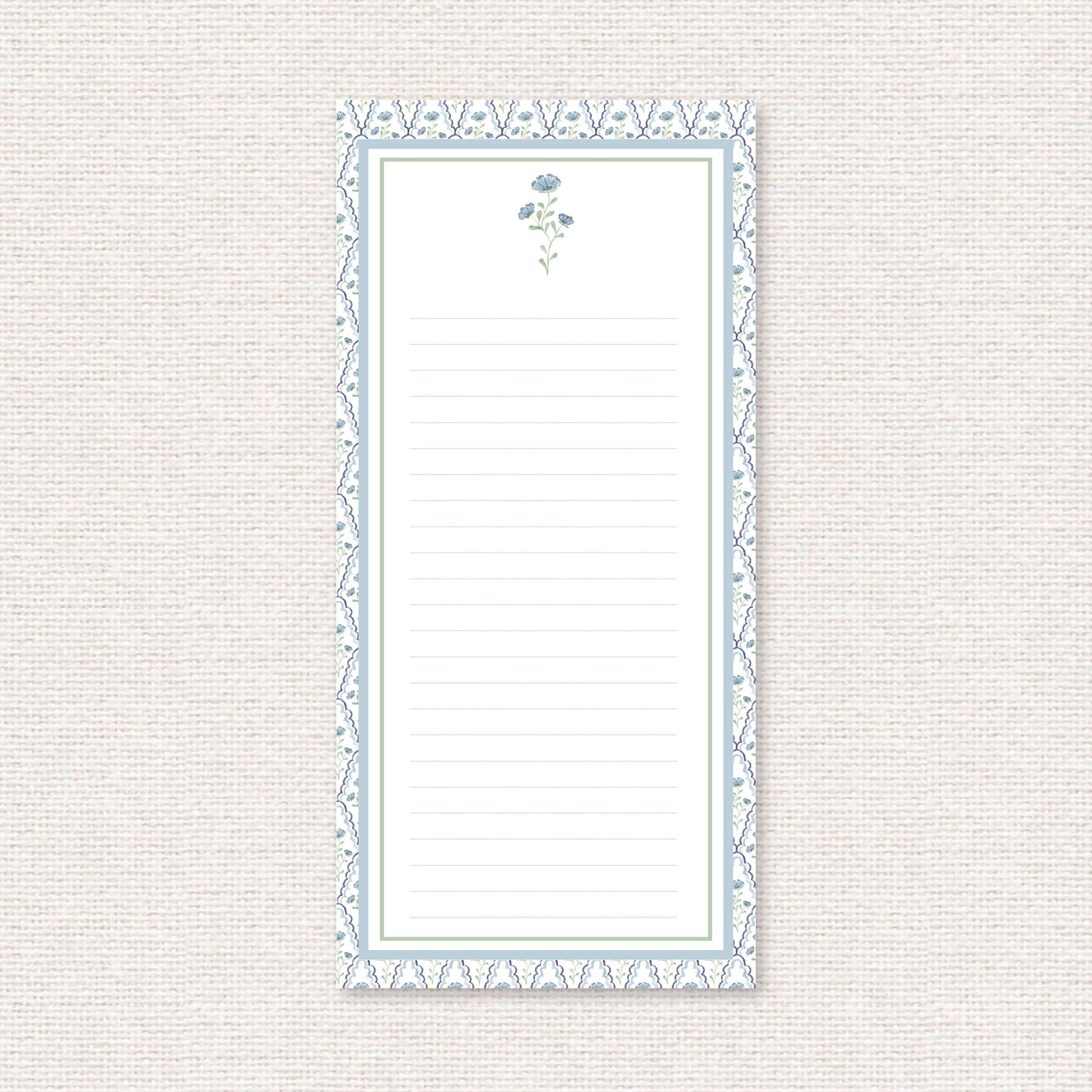 The Estelle Suite list pad, a grand-millennial pattern of blue flowers with scalloped lattice