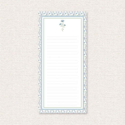The Estelle Suite list pad, a grand-millennial pattern of blue flowers with scalloped lattice