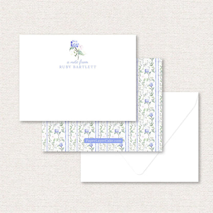 The Eloise Suite flat note, blue hydrangeas and pink flowers with dotted vertical lines
