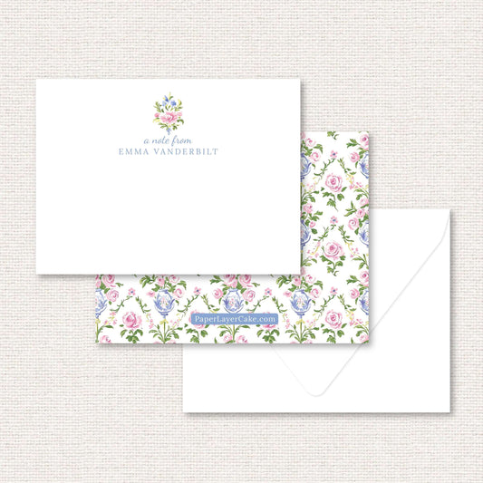 The Daphne flat note, a grand-millennial pattern of pink and blue flowers in a blue vase