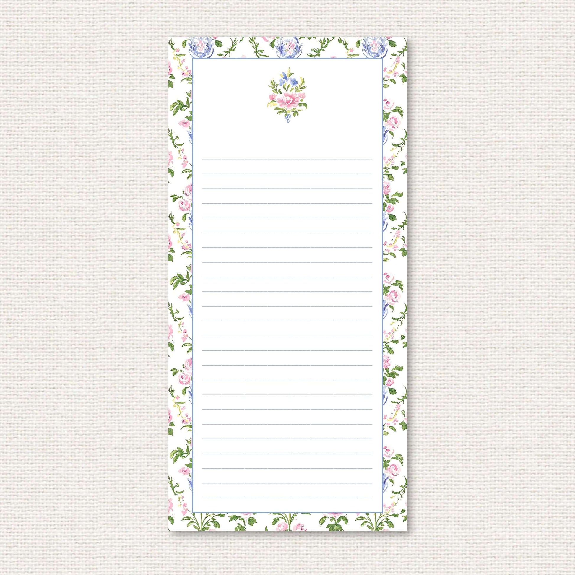 The Daphne Suite list pad, a grand-millennial pattern of pink and blue flowers in a blue vase