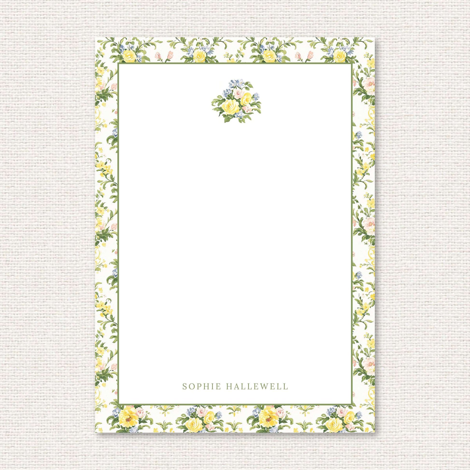 The Penelope Suite personalized notepad, a grand-millennial pattern of yellow, blue, and pink rose damask