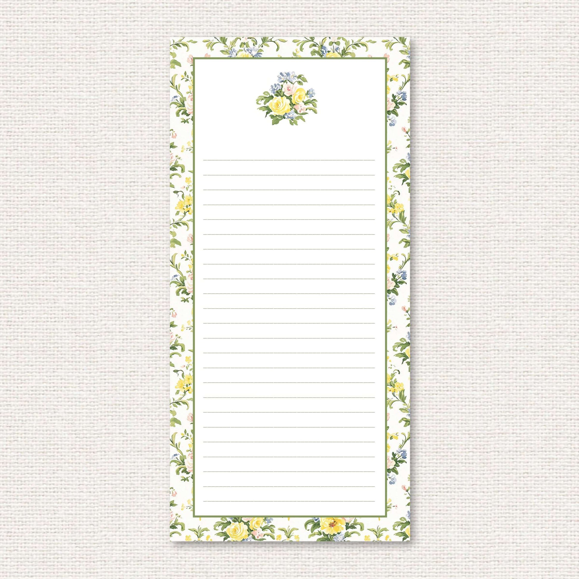 The Penelope Suite list pad, a grand-millennial pattern of yellow, blue, and pink rose damask