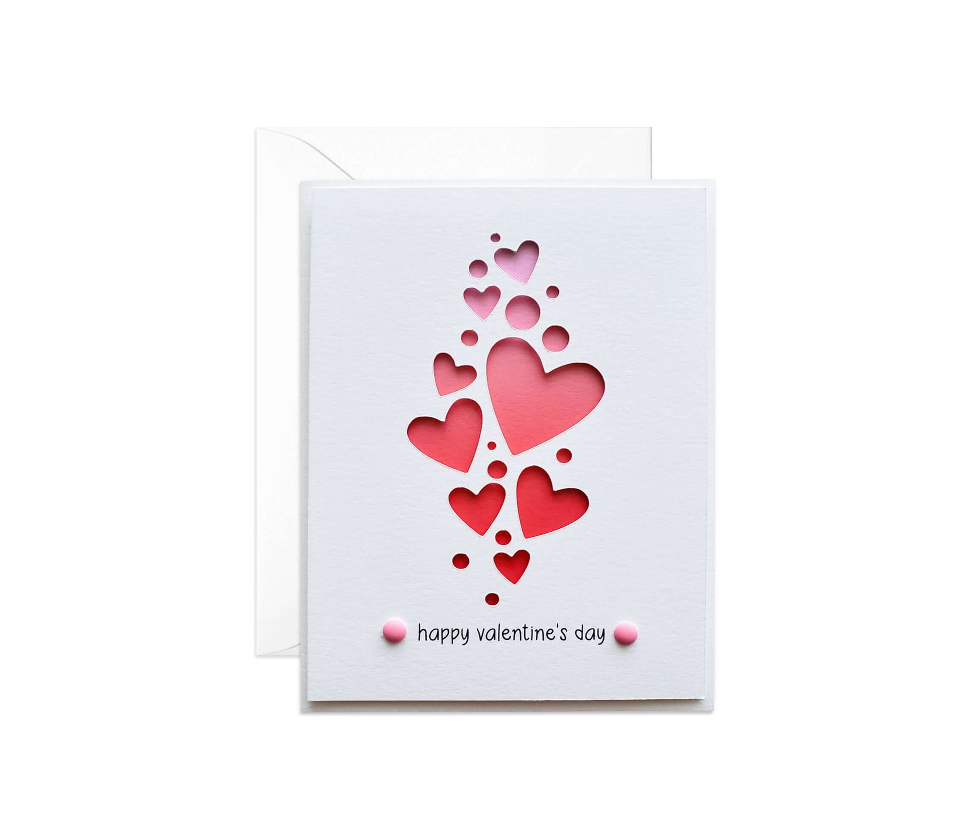 Di cut Valentine's Day card with a pink gradient and different sized hearts