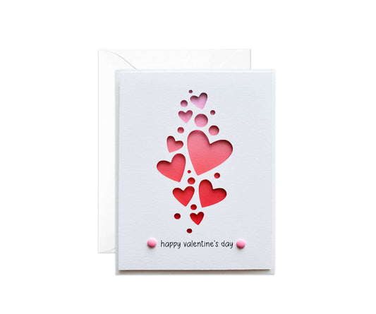 Di cut Valentine's Day card with a pink gradient and different sized hearts